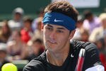 MELBOURNE, AUSTRALIA - JANUARY 11:  Bernard Tomic of Australia plays backhand during his match against Tomas Berdych of the Czech Republic during day one of the AAMI Classic at Kooyong on January 11, 2012 in Melbourne, Australia.  (Photo by Lucas Dawson/Getty Images)