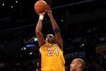 LOS ANGELES, CA - JANUARY 10:  Kobe Bryant #24 of the Los Angeles Lakers shoots over Grant Hill #33 of the Phoenix Suns at Staples Center on January 10, 2012 in Los Angeles, California. NOTE TO USER: User expressly acknowledges and agrees that, by downloading and or using this photograph, User is consenting to the terms and conditions of the Getty Images License Agreement.  (Photo by Stephen Dunn/Getty Images)