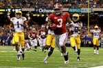 NEW ORLEANS, LA - JANUARY 09:  Trent Richardson #3 of the Alabama Crimson Tide runs for a 34 yard touchdown in the fourth quarter against Morris Claiborne #17 of the Louisiana State University Tigers during the 2012 Allstate BCS National Championship Game at Mercedes-Benz Superdome on January 9, 2012 in New Orleans, Louisiana.  (Photo by Ronald Martinez/Getty Images)