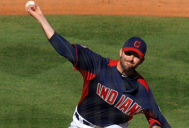 GOODYEAR, AZ - MARCH 11:  Justin Germano #39 of the Cleveland Indians delivers a pitch against the Seattle Mariners at Goodyear Ballpark on March 11, 2011 in Goodyear, Arizona.  (Photo by Norm Hall/Getty Images)