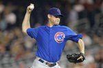 WASHINGTON, DC - JULY 06:  Reliever Kerry Wood #34 of the Chicago Cubs pitches against the Washington Nationals during the seventh inning at Nationals Park on July 6, 2011 in Washington, DC.  (Photo by Rob Carr/Getty Images)