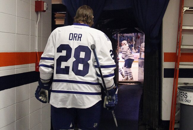 UNIONDALE, NY - DECEMBER 23:  Colton Orr #28 of the Toronto Maple Leafs walks out to play against the New York Islanders at the Nassau Veterans Memorial Coliseum on December 23, 2011 in Uniondale, New York.  (Photo by Bruce Bennett/Getty Images)