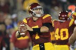 LOS ANGELES, CA - NOVEMBER 26:  Quarterback Matt Barkley #7 of the USC Trojans throws a pass against the UCLA Bruins at the Los Angeles Memorial Coliseum on November 26, 2011 in Los Angeles, California.  (Photo by Stephen Dunn/Getty Images)