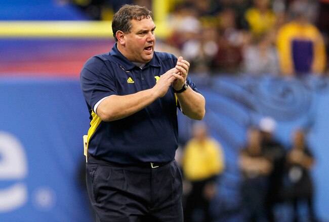 NEW ORLEANS, LA - JANUARY 03:  Head coach Brady Hoke of the Michigan Wolverines applauds his teams play against the Virginia Tech Hokies during the Allstate Sugar Bowl at Mercedes-Benz Superdome on January 3, 2012 in New Orleans, Louisiana.  (Photo by Kevin C. Cox/Getty Images)