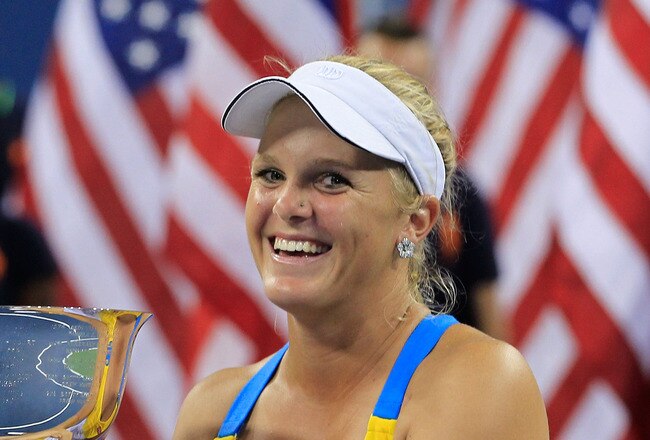NEW YORK, NY - SEPTEMBER 09:  Melanie Oudin (R) and Jack Sock (L) of the United States pose with the first place trophy after defeating Eduardo Schwank and Gisela Dulko of Argentina during Day Twelve of the 2011 US Open at the USTA Billie Jean King National Tennis Center on September 9, 2011 in the Flushing neighborhood of the Queens borough of New York City. Oudin and Sock defeated Schwank and Dulko 7-6, 4-6, 10-8.  (Photo by Chris Trotman/Getty Images)