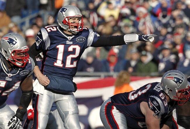 FOXBORO, MA - DECEMBER 24: Tom Brady #12 of the New England Patriots directs his players during the first quarter  against the Miami Dolphins at Gillette Stadium on December 24, 2011 in Foxboro, Massachusetts.  (Photo by Winslow Townson/Getty Images)