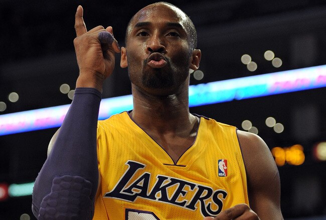 LOS ANGELES, CA - DECEMBER 19:  Kobe Bryant #24 of the Los Angeles Lakers reacts after a basket and a foul during the game against the Los Angeles Clippers at Staples Center on December 19, 2011 in Los Angeles, California.  (Photo by Harry How/Getty Images)