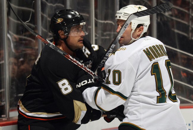 ANAHEIM, CA - JANUARY 10: Teemu Selanne #8 of the Anaheim Ducks and Brenden Morrow #10 of the Dallas Stars battle during the third period at the Honda Center on January 10, 2012 in Anaheim, California.  The Ducks defeated the Stars 5-2. (Photo by Bruce Bennett/Getty Images)