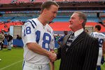 MIAMI GARDENS, FL - JANUARY 30:  Quarterback Peyton Manning #18 of the Indianapolis Colts shakes hands with team owner Jim Irsay during Media Day at Dolphin Stadium on January 30, 2007 in Miami Gardens, Florida.  (Photo by Scott Halleran/Getty Images)