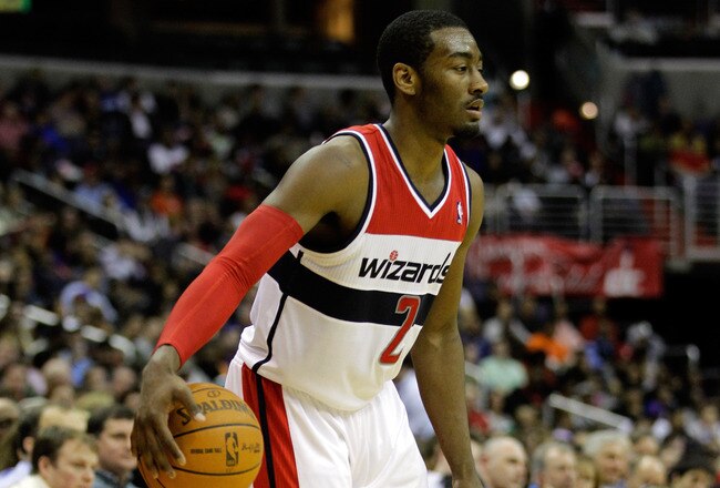 WASHINGTON, DC - JANUARY 06:  John Wall #2 of the Washington Wizards brings the ball up the floor against the New York Knicks at Verizon Center on January 6, 2012 in Washington, DC.  NOTE TO USER: User expressly acknowledges and agrees that, by downloading and or using this photograph, User is consenting to the terms and conditions of the Getty Images License Agreement.  (Photo by Rob Carr/Getty Images)