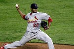 ARLINGTON, TX - OCTOBER 23: Edwin Jackson #22 of the St. Louis Cardinals pitches in the fifth inning during Game Four of the MLB World Series against the Texas Rangers at Rangers Ballpark in Arlington on October 23, 2011 in Arlington, Texas.  (Photo by Rob Carr/Getty Images)
