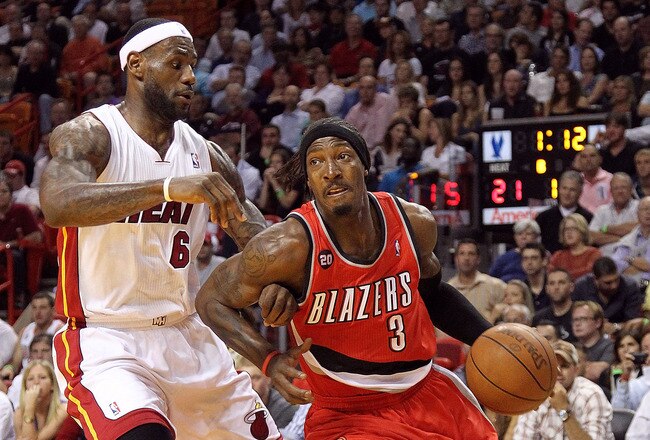MIAMI, FL - MARCH 08:  Gerald Wallace #3 of the Portland Trail Blazers drives by LeBron James #6 of the Miami Heat during a game at American Airlines Arena on March 8, 2011 in Miami, Florida. NOTE TO USER: User expressly acknowledges and agrees that, by downloading and/or using this Photograph, User is consenting to the terms and conditions of the Getty Images License Agreement.  (Photo by Mike Ehrmann/Getty Images)
