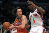 NEW YORK, NY - JANUARY 17:  Steve Nash #13 of the Phoenix Suns drives to the basket against Amar'e Stoudemire #1 of the New York Knicks at Madison Square Garden on January 17, 2011 in New York City. NOTE TO USER: User expressly acknowledges and agrees that, by downloading and or using this photograph, User is consenting to the terms and conditions of the Getty Images License Agreement.  (Photo by Nick Laham/Getty Images)