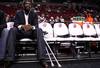 PORTLAND, OR - OCTOBER 10:  Greg Oden #52 of the Portland Trail Blazers, who is out for the season after under going micro fracture surgery in his knee, sits on the bench to watch a pre-season game against the Los Angeles Clippers at the Rose Garden on October 10, 2007 in Portland, Oregon.  NOTE TO USER: User expressly acknowledges and agrees that, by downloading and or using this Photograph, user is consenting to the terms and conditions of the Getty Images License Agreement.  (Photo by Jonathan Ferrey/Getty Images)