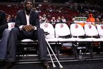 PORTLAND, OR - OCTOBER 10:  Greg Oden #52 of the Portland Trail Blazers, who is out for the season after under going micro fracture surgery in his knee, sits on the bench to watch a pre-season game against the Los Angeles Clippers at the Rose Garden on October 10, 2007 in Portland, Oregon.  NOTE TO USER: User expressly acknowledges and agrees that, by downloading and or using this Photograph, user is consenting to the terms and conditions of the Getty Images License Agreement.  (Photo by Jonathan Ferrey/Getty Images)