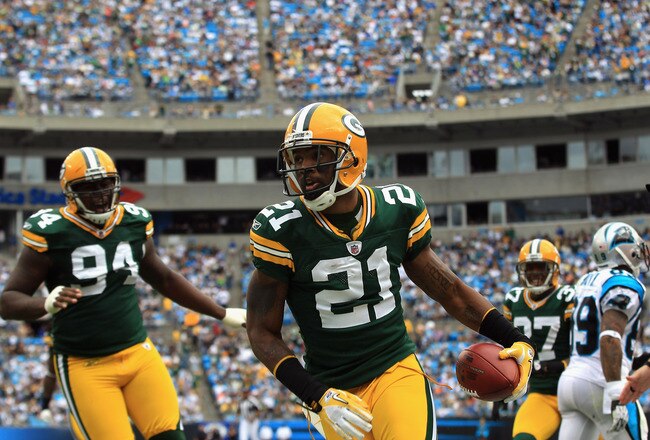 CHARLOTTE, NC - SEPTEMBER 18:   Charles Woodson #21 of the Green Bay Packers celebrates after recovering a fumble against the Carolina Panthers during their game at Bank of America Stadium on September 18, 2011 in Charlotte, North Carolina.  (Photo by Streeter Lecka/Getty Images)
