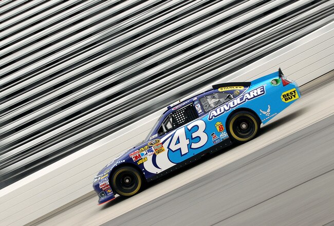 MARTINSVILLE, VA - OCTOBER 29:  A.J. Allmendinger drives the #43 AdvoCare Ford during practice for the NASCAR Sprint Cup Series TUMS Fast Relief 500 at Martinsville Speedway on October 29, 2011 in Martinsville, Virginia.  (Photo by Streeter Lecka/Getty Images)