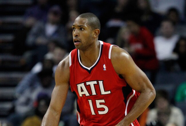 CHARLOTTE, NC - JANUARY 06:  Al Horford #15 of the Atlanta Hawks against the Charlotte Bobcats during their game at Time Warner Cable Arena on January 6, 2012 in Charlotte, North Carolina.  NOTE TO USER: User expressly acknowledges and agrees that, by downloading and or using this photograph, User is consenting to the terms and conditions of the Getty Images License Agreement.  (Photo by Streeter Lecka/Getty Images)