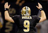 NEW ORLEANS, LA - JANUARY 07:   Drew Brees #9 of the New Orleans Saints celebrates after throwing a touchdown pass to Robert Meachem #17 in the fourth quarter against the Detroit Lions during their 2012 NFC Wild Card Playoff game at Mercedes-Benz Superdome on January 7, 2012 in New Orleans, Louisiana.  (Photo by Chris Graythen/Getty Images)