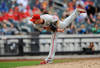 NEW YORK, NY - SEPTEMBER 25:  Ryan Madson #46 of the Philadelphia Phillies throws a pitch against the New York Mets in the ninth inning during a game at Citi Field on September 25, 2011 in the Flushing neighborhood of the Queens borough of New York City.  (Photo by Patrick McDermott/Getty Images)