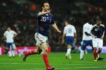 LONDON, ENGLAND - NOVEMBER 17:  Mathieu Valbuena of France celebrates as he scores their second goal during the international friendly match between England and France at Wembley Stadium on November 17, 2010 in London, England.  (Photo by Laurence Griffiths/Getty Images)