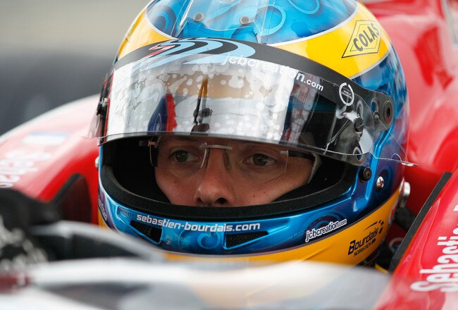 BIRMINGHAM, AL - APRIL 08:  Sebastian Bourdais of France, driver of the #19 Dale Coyne Racing Dallara Honda, waits in the pit during practice for the IndyCar Series Honda Indy Grand Prix of Alabama at Barber Motorsports Park on April 8, 2011 in Birmingham, Alabama.  (Photo by Kevin C. Cox/Getty Images)