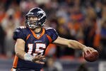 DENVER, CO - JANUARY 08:  Quarterback Tim Tebow #15 of the Denver Broncos drops back to pass during the AFC Wild Card Playoff game at Sports Authority Field against the Pittsburgh Steelers at Mile High on January 8, 2012 in Denver, Colorado.  (Photo by Jeff Gross/Getty Images)