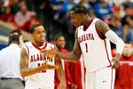 ATLANTA, GA - MARCH 11:  JaMychal Green #1 and Trevor Releford #12 of the Alabama Crimson Tide celebrate after drawing a foul during the quarterfinals of the SEC Men's Basketball Tournament at Georgia Dome on March 11, 2011 in Atlanta, Georgia.  (Photo by Kevin C. Cox/Getty Images)