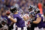 BALTIMORE, MD - OCTOBER 16: Quarterback Joe Flacco #5 of the Baltimore Ravens throws a pass against the Houston Texans at M&T Bank Stadium on October 16, 2011 in Baltimore, Maryland. The Ravens won 29-14.  (Photo by Rob Carr/Getty Images)