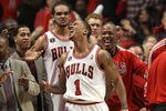 CHICAGO, IL - MAY 15:  (L-R) Kurt Thomas #40, John Lucas III, Joakim Noah #13, Derrick Rose #1 and Keith Bogans #6 of the Chicago Bulls celebrate late in the fourth quarter against the Miami Heat in Game One of the Eastern Conference Finals during the 2011 NBA Playoffs on May 15, 2011 at the United Center in Chicago, Illinois. The Bulls won 103-82. NOTE TO USER: User expressly acknowledges and agrees that, by downloading and or using this photograph, User is consenting to the terms and conditions of the Getty Images License Agreement  (Photo by Jonathan Daniel/Getty Images)