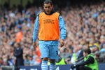 MANCHESTER, ENGLAND - SEPTEMBER 24:  Carlos Tevez of Manchester City looks on from the sidelines during the Barclays Premier League match between Manchester City and Everton at the Etihad Stadium on September 24, 2011 in Manchester, England.  (Photo by Michael Regan/Getty Images)