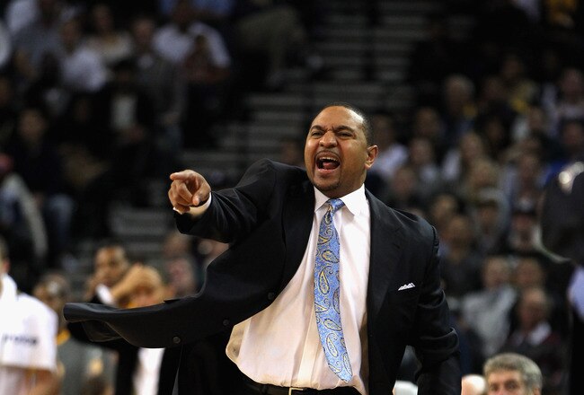 OAKLAND, CA - DECEMBER 28:  Head coach Mark Jackson of the Golden State Warriors shouts to his team during their game against the New York Knicks at Oracle Arena on December 28, 2011 in Oakland, California.  NOTE TO USER: User expressly acknowledges and agrees that, by downloading and or using this photograph, User is consenting to the terms and conditions of the Getty Images License Agreement.  (Photo by Ezra Shaw/Getty Images)