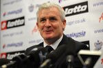 LONDON, ENGLAND - JANUARY 11:  New manager Mark Hughes of Queens Park Rangers talks to the press during the unveiling of the new Queens Park Rangers Manager at Loftus Road on January 11, 2012 in London, England.  (Photo by Christopher Lee/Getty Images)