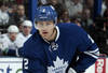 TORONTO, CANADA - DECEMBER 17: Luke Schenn #2 of the Toronto Maple Leafs prepares for a faceoff during NHL action against the Vancouver Canucks at The Air Canada Centre December 17, 2011 in Toronto, Ontario, Canada. (Photo by Abelimages/Getty Images)