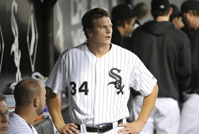 CHICAGO, IL - SEPTEMBER 13:  Starting pitcher Gavin Floyd #34 of the Chicago White Sox stands in the dugout during the second inning against the Detroit Tigers at U.S. Cellular Field on September 13, 2011 in Chicago, Illinois.  (Photo by Brian Kersey/Getty Images)