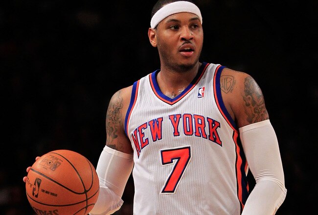 NEW YORK, NY - JANUARY 09: Carmelo Anthony #7 of the New York Knicks dribbles against the Charlotte Bobcats at Madison Square Garden on January 9, 2012 in New York City. NOTE TO USER: User expressly acknowledges and agrees that, by downloading and or using this photograph, User is consenting to the terms and conditions of the Getty Images License Agreement.  (Photo by Chris Trotman/Getty Images)