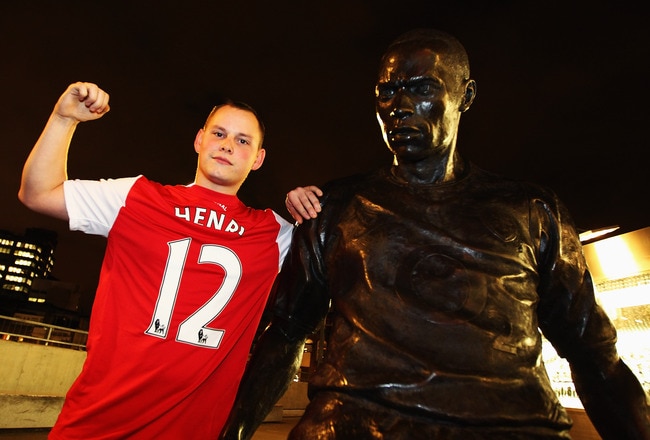 LONDON, ENGLAND - JANUARY 09:  Fans are seen near the Thierry Henry statue outside the ground before the FA Cup Third Round match between Arsenal and Leeds United at the Emirates Stadium on January 9, 2012 in London, England.  (Photo by Clive Mason/Getty Images)