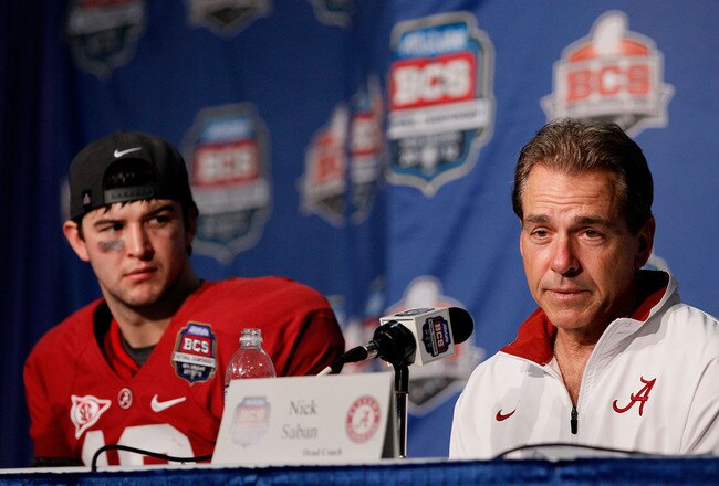 NEW ORLEANS, LA - JANUARY 09:  Head coach Nick Saban and AJ McCarron #10 of the Alabama Crimson Tide speak to the media after defeating Louisiana State University Tigers in the 2012 Allstate BCS National Championship Game at Mercedes-Benz Superdome on January 9, 2012 in New Orleans, Louisiana. Alabama won the game by a score of 21-0.  (Photo by Chris Graythen/Getty Images)