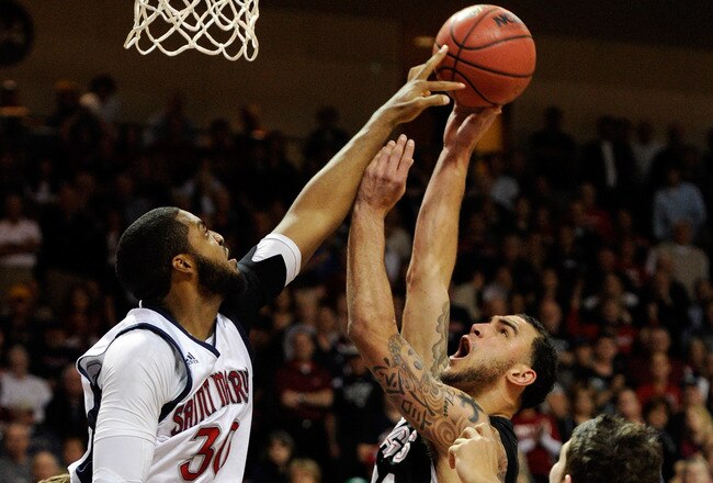 LAS VEGAS, NV - MARCH 07:  Kenton Walker II #30 of the Saint Mary's Gaels blocks a shot by Robert Sacre #00 of the Gonzaga Bulldogs during the championship game of the Zappos.com West Coast Conference Basketball tournament at the Orleans Arena March 7, 2011 in Las Vegas, Nevada. Gonzaga won 75-63.  (Photo by Ethan Miller/Getty Images)