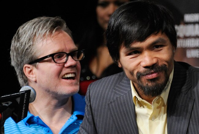 LAS VEGAS, NV - NOVEMBER 09:  Trainer Freddie Roach (L) and boxer Manny Pacquiao appear during the final news conference for Pacquiao's bout with Juan Manuel Marquez at the MGM Grand Hotel/Casino November 9, 2011 in Las Vegas, Nevada. Pacquiao will defend his WBO welterweight title against Marquez when the two meet in the ring for the third time on November 12 in Las Vegas.  (Photo by Ethan Miller/Getty Images)
