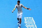 MELBOURNE, AUSTRALIA - JANUARY 13:  Novak Djokovic of Serbia hits a backhand during a practice session ahead of the 2012 Australian Open at Rod Laver Arena on January 13, 2012 in Melbourne, Australia.  (Photo by Mark Dadswell/Getty Images)