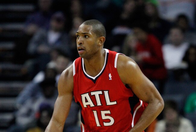 CHARLOTTE, NC - JANUARY 06:  Al Horford #15 of the Atlanta Hawks against the Charlotte Bobcats during their game at Time Warner Cable Arena on January 6, 2012 in Charlotte, North Carolina.  NOTE TO USER: User expressly acknowledges and agrees that, by downloading and or using this photograph, User is consenting to the terms and conditions of the Getty Images License Agreement.  (Photo by Streeter Lecka/Getty Images)