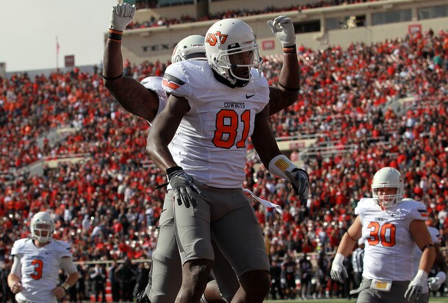 LUBBOCK, TX - NOVEMBER 12:  Justin Blackmon #81 of the Oklahoma State Cowboys celebrates a touchdown against the Texas Tech Red Raiders at Jones AT&T Stadium on November 12, 2011 in Lubbock, Texas.  (Photo by Ronald Martinez/Getty Images)
