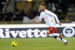 BOLOGNA, ITALY - DECEMBER 21:  Daniele De Rossi # 16 of AS Roma in action during the Serie A match between Bologna FC and AS Roma at Stadio Renato Dall'Ara on December 21, 2011 in Bologna, Italy.  (Photo by Mario Carlini / Iguana Press/Getty Images)
