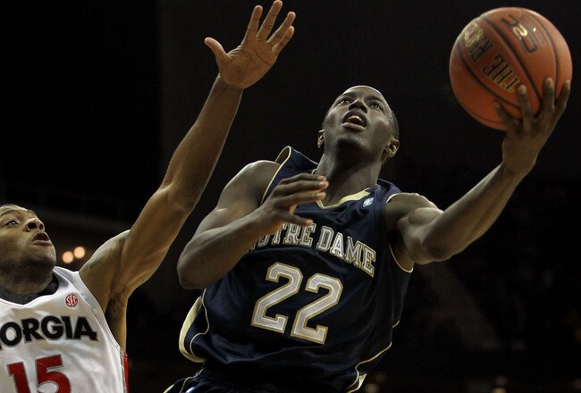 KANSAS CITY, MO - NOVEMBER 22:  Jerian Grant #22 of the Notre Dame Fighting Irish shoots while Donte Williams #15 of the Georgia Bulldogs tries to block during the Progressive CBE Classic consolation game on November 22, 2011 at the Sprint Center in Kansas City, Missouri.  (Photo by Jamie Squire/Getty Images)