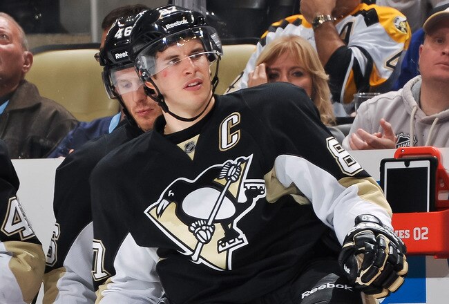 PITTSBURGH, PA - DECEMBER 5:  Sidney Crosby #87 of the Pittsburgh Penguins goes over the boards to take a shift against the Boston Bruins on December 5, 2011 at CONSOL Energy Center in Pittsburgh, Pennsylvania.  (Photo by Jamie Sabau/Getty Images)
