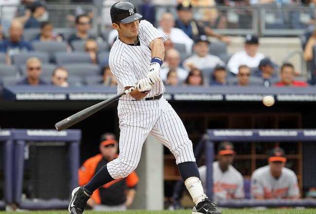 NEW YORK, NY - SEPTEMBER 05:  Jesus Montero #63 of the New York Yankees connects on a fifth inning home run against the Baltimore Orioles on September 5, 2011 at Yankee Stadium in the Bronx borough of New York City. The blast was the first in the major leagues for Montero. (Photo by Jim McIsaac/Getty Images)