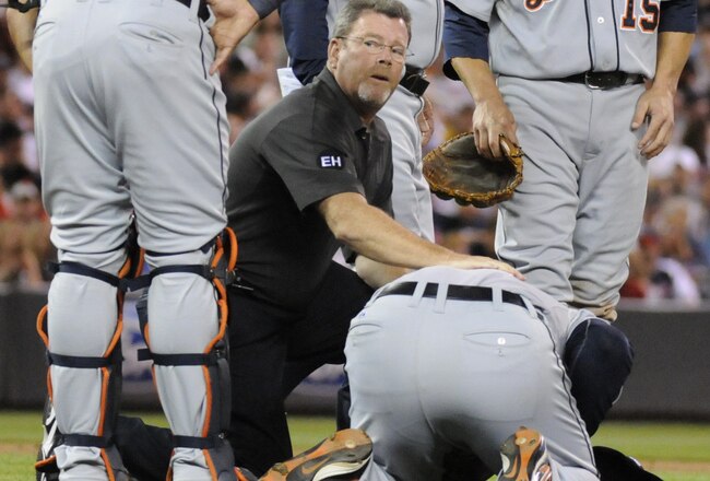 MINNEAPOLIS, MN - JUNE 28: Gerald Laird #12, manager Jim Leyland #10 and Brandon Inge #15 of the Detroit Tigers look on as Joel Zumaya #54 is looked at by a trainer in the eighth inning against the Minnesota Twins during their game on June 28, 2010 at Target Field in Minneapolis, Minnesota. Tigers defeated the Twins 7-5. (Photo by Hannah Foslien /Getty Images)