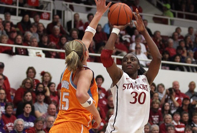 PALO ALTO, CA - DECEMBER 20:  Nnemkadi Ogwumike #30 of the Stanford Cardinal shoots over Alicia Manning #15 of the Tennessee Lady Volunteers at Maples Pavilion on December 20, 2011 in Palo Alto, California.  (Photo by Ezra Shaw/Getty Images)