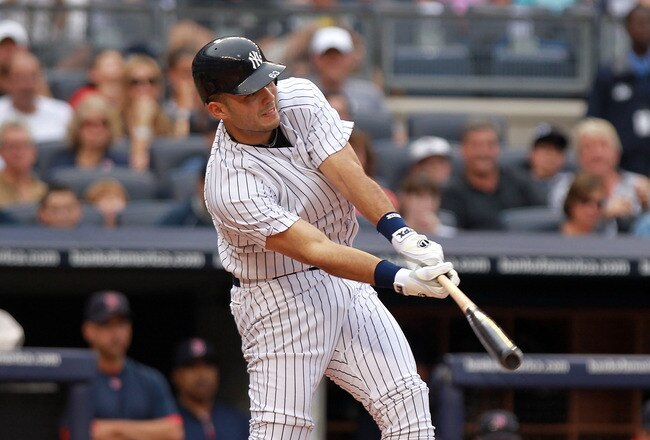 NEW YORK, NY - SEPTEMBER 24: Jesus Montero #63 of the New York Yankees hits an RBI single in the second inning against the Boston Red Sox on September 24, 2011 at Yankee Stadium in the Bronx borough of New York City.  (Photo by Nick Laham/Getty Images)